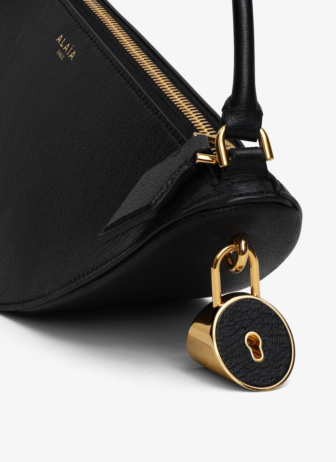 LE DEMI-CŒUR BAG IN GOATSKIN ALAÏA BLACK LE DEMI-CŒUR BAG IN GOATSKIN